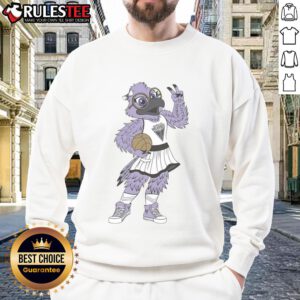 Alt Text: Violet the Raven mascot poses in a Nice Golden State Valkyries WNBA sweatshirt, showcasing team spirit and style.