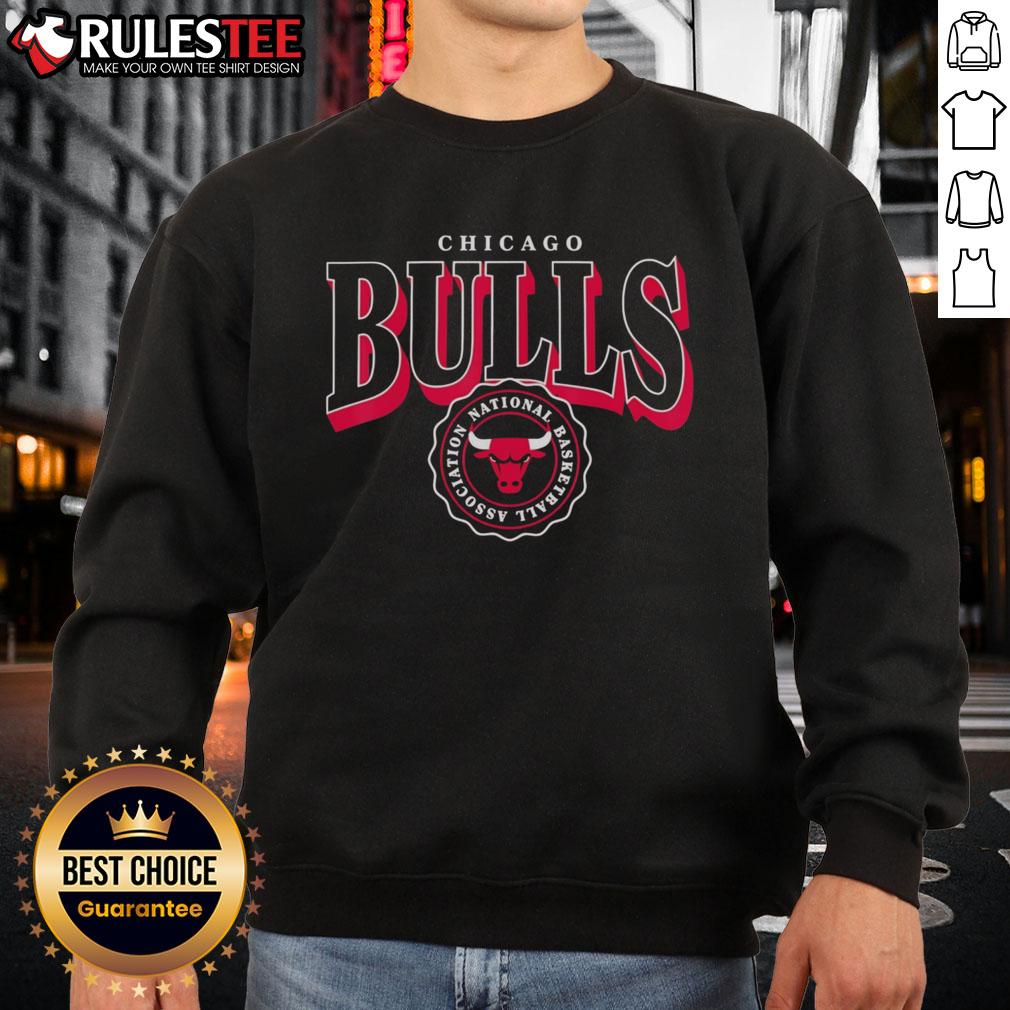 Alt Text: Nice NBA Chicago Bulls Arched Crest Sweatshirt featuring team colors and logo for stylish fan apparel.