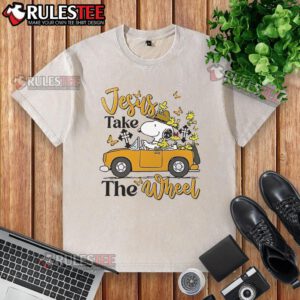 Alt Text: Nice Snoopy Jesus Take The Wheel washed t-shirt featuring a playful Snoopy graphic and inspirational text.