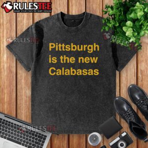Premium Pittsburgh Is The New Calabasas washed t-shirt displayed on a wooden background, showcasing trendy streetwear style.