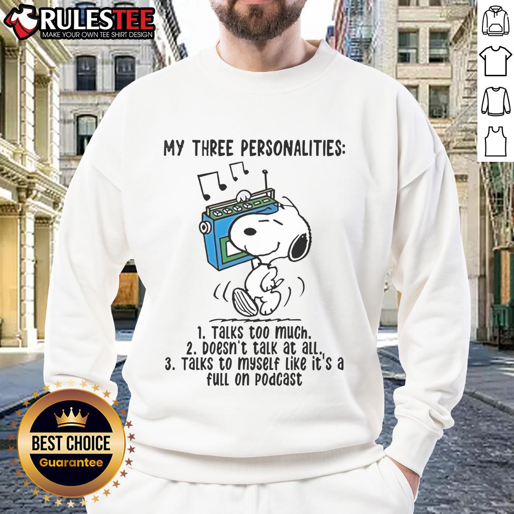Cozy sweatshirt featuring Snoopy with 'My Three Personalities: Talks Too Much, Doesn't Talk At All' design, perfect for fans.