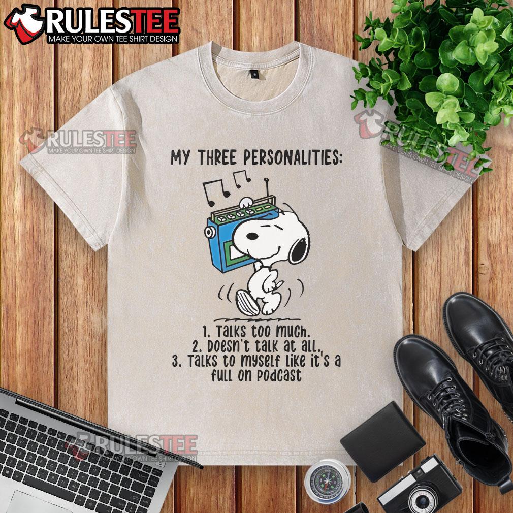 Alt Text: Snoopy graphic on a washed t-shirt depicting 'My Three Personalities: Talks Too Much, Doesn't Talk at All' design.