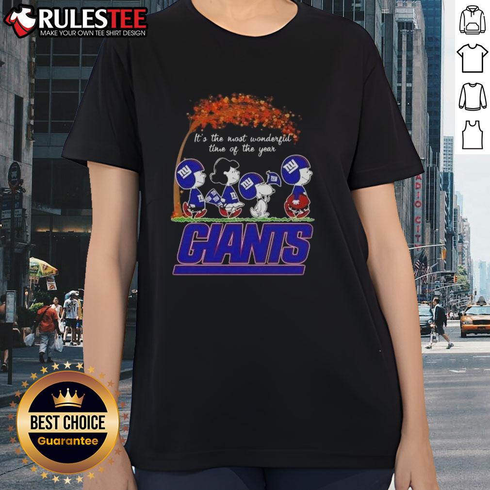 Awesome Peanuts New York Giants football ladies tee celebrating the most wonderful time of the year, perfect for fans.
