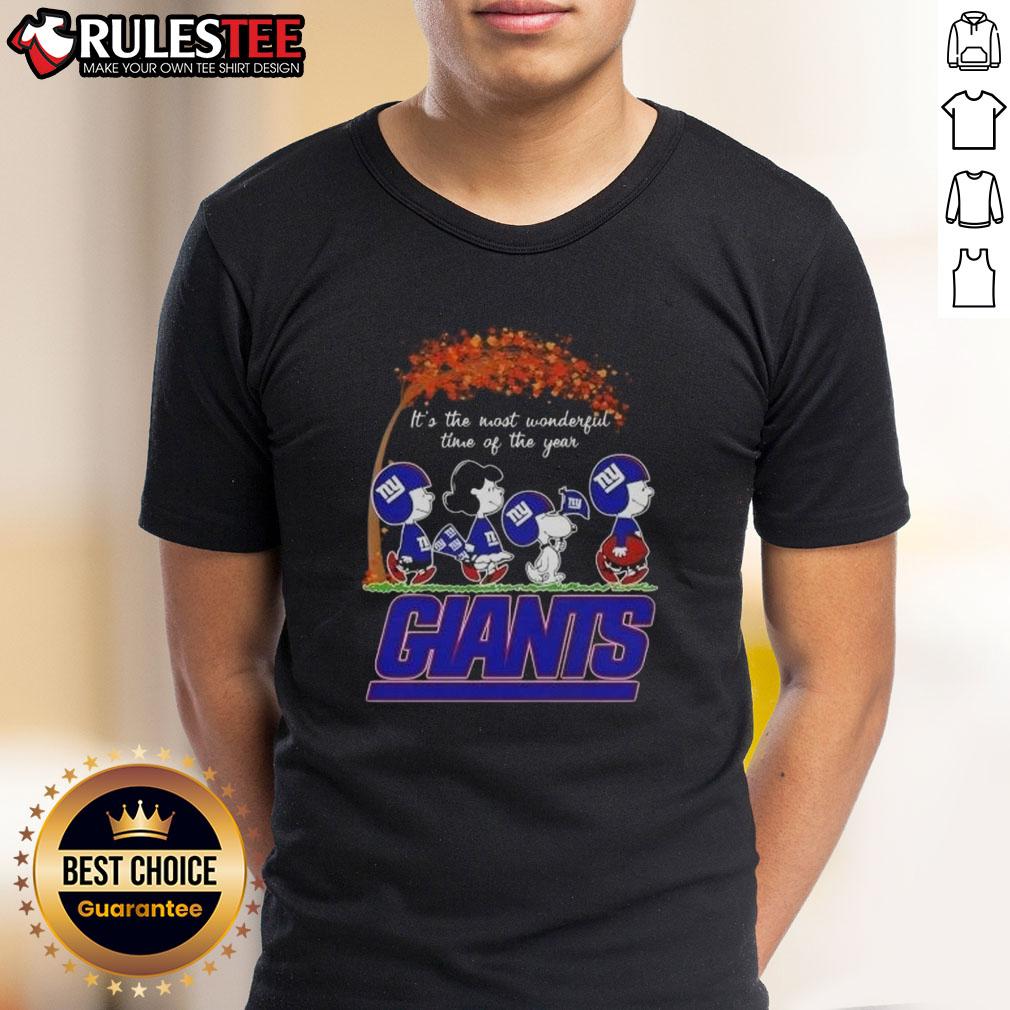 Alt Text: Awesome Peanuts It's The Most Wonderful Time Of The Year New York Giants football T-shirt featuring festive design.