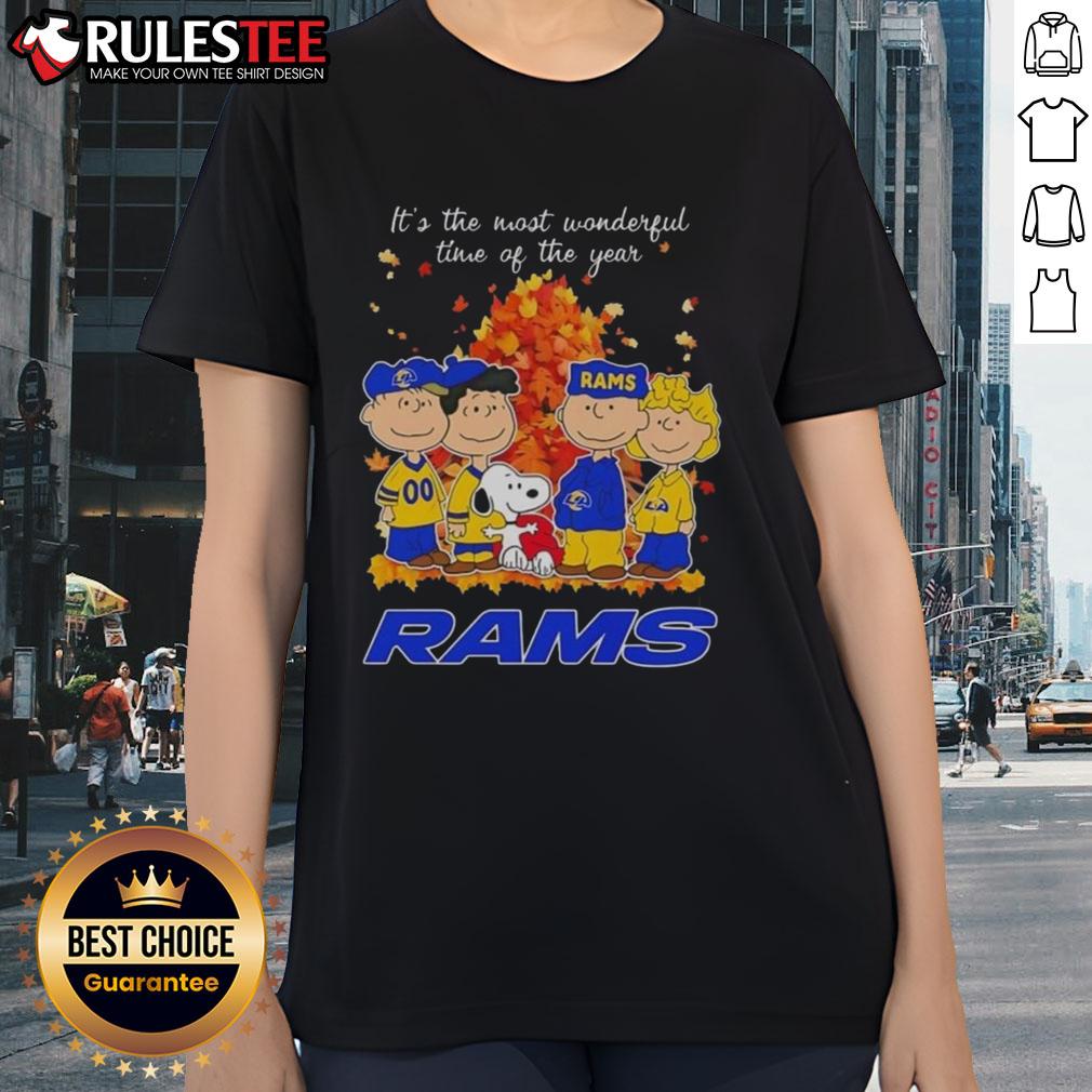 Awesome Peanuts character graphic on Los Angeles Rams ladies tee for the holiday season - perfect festive apparel.