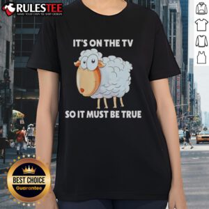 Funny sheep graphic on a ladies tee, featuring the phrase 'It's on the TV, so it must be true.'