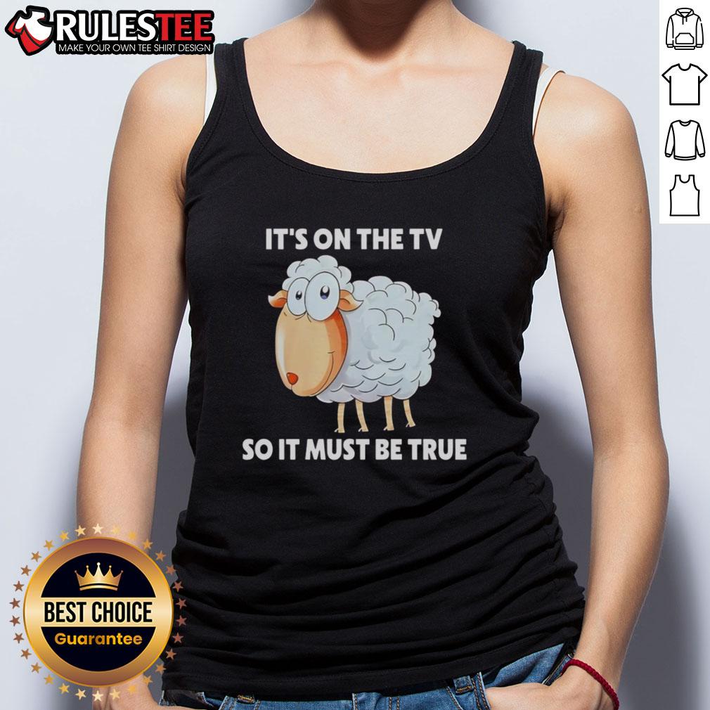 Funny sheep tank top with 'It's on the TV, so it must be true' slogan, perfect for casual wear and humor lovers.