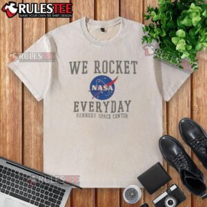 Funny We Rocket NASA Everyday washed t-shirt displayed at Kennedy Space Center, perfect for space enthusiasts.