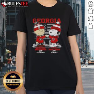 Alt Text: Good Charlie Brown Georgia Bulldogs Saturdays x Snoopy Atlanta Falcons Sundays Skyline Ladies Tee design.