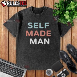 Self-made man wearing a washed t-shirt, showcasing confidence and style in a casual setting.