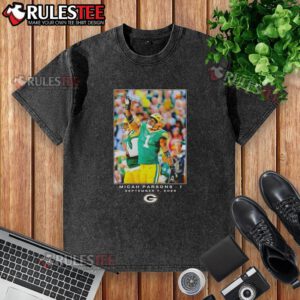 Micah Parsons wearing a Nice Green Bay Week 1 washed t-shirt, showcasing vibrant colors and casual style.