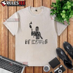 Alt Text: Nice The Mandalorian and Grogu science fiction movie graphic on a breathable washed T-shirt for fans.