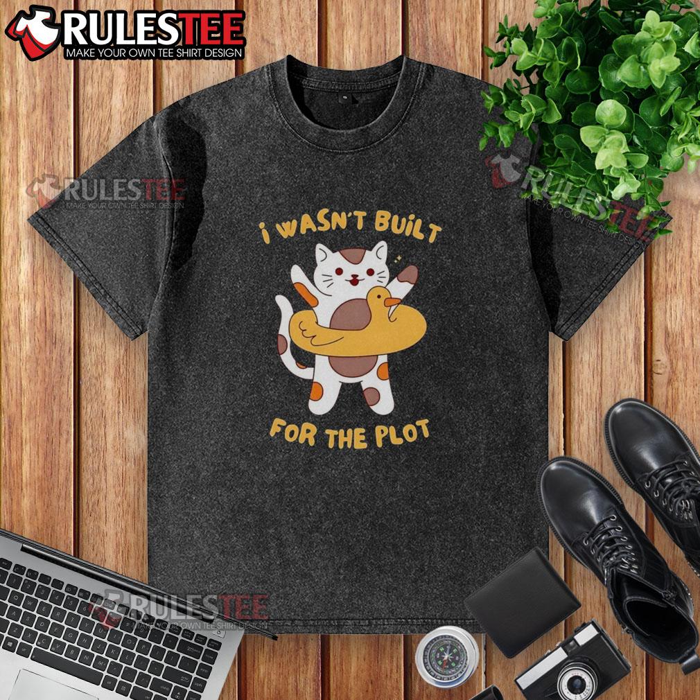 Awesome cat graphic on 'I Wasn't Built for the Plot' washed t-shirt, perfect for casual wear and cat lovers.