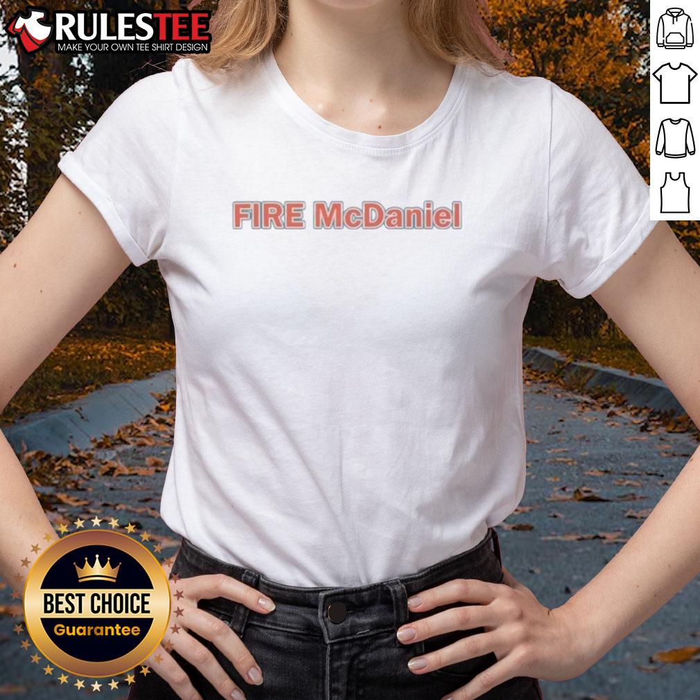Stylish Miami Dolphins tee for women featuring 'Fire Mike McDaniel' design, perfect for fans supporting the team.